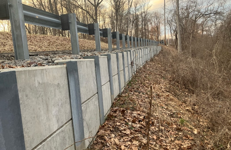 retaining wall along a banked highway