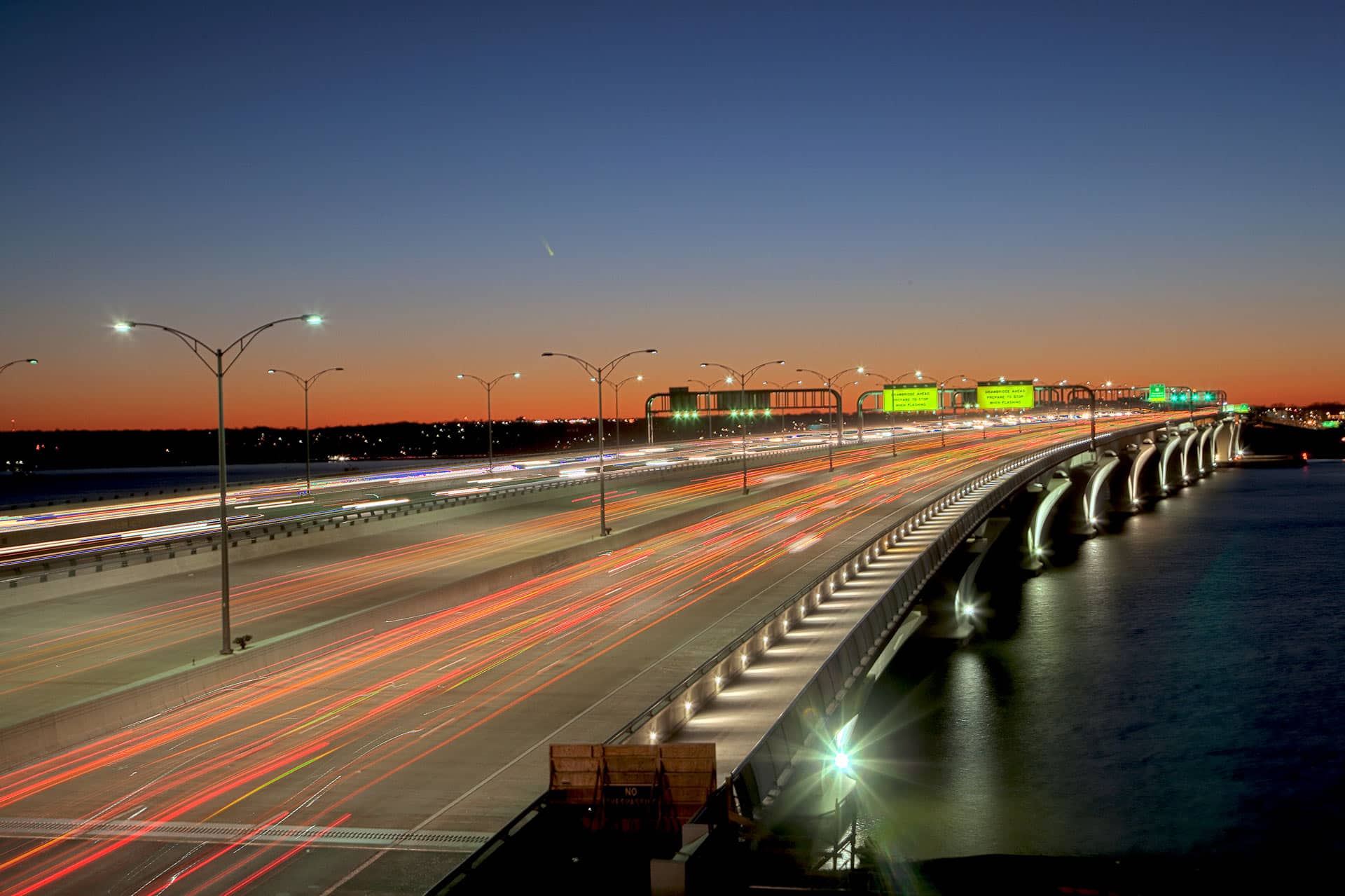 traffic on highway bridge over river