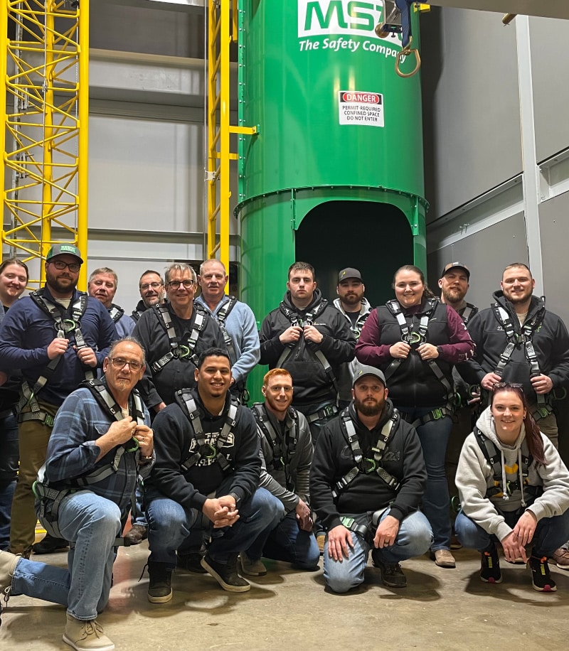 construction crew smiling at their safety training